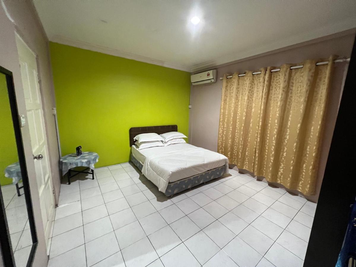 Hanif Homestay Кучинг Экстерьер фото
