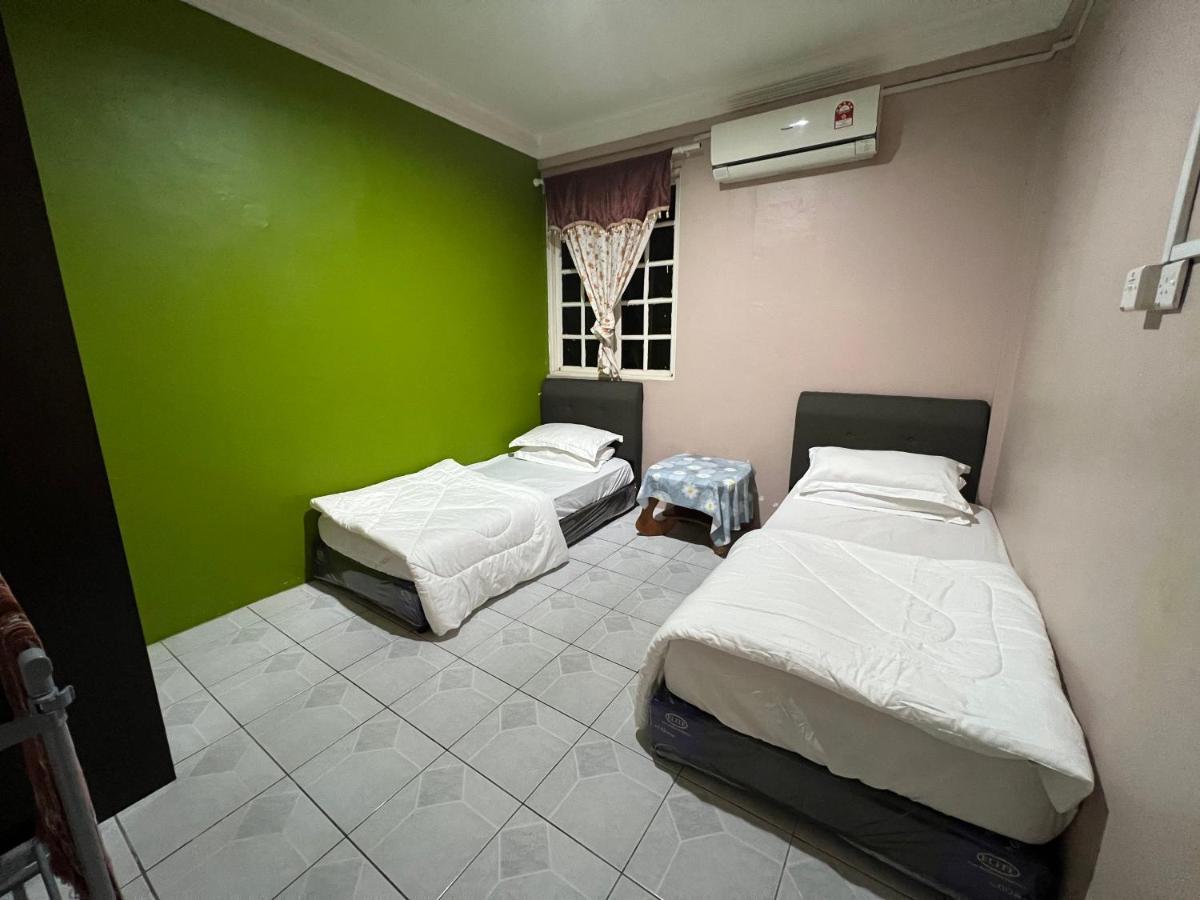 Hanif Homestay Кучинг Экстерьер фото